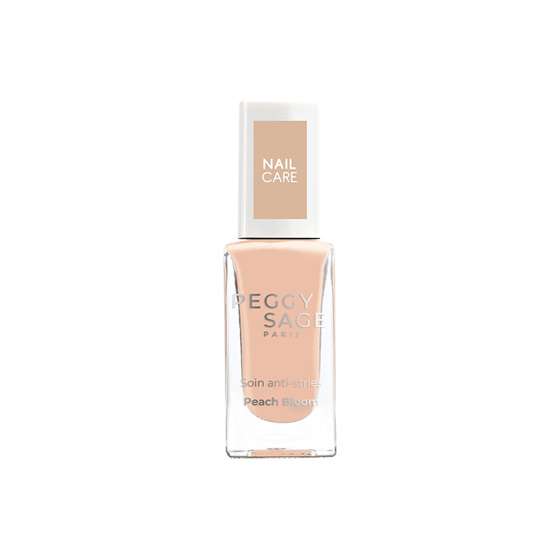 Soin perfecteur façon "CC nails", ce vernis hybride sublime l'apparence naturelle de l'ongle : il floute les imperfections et dé